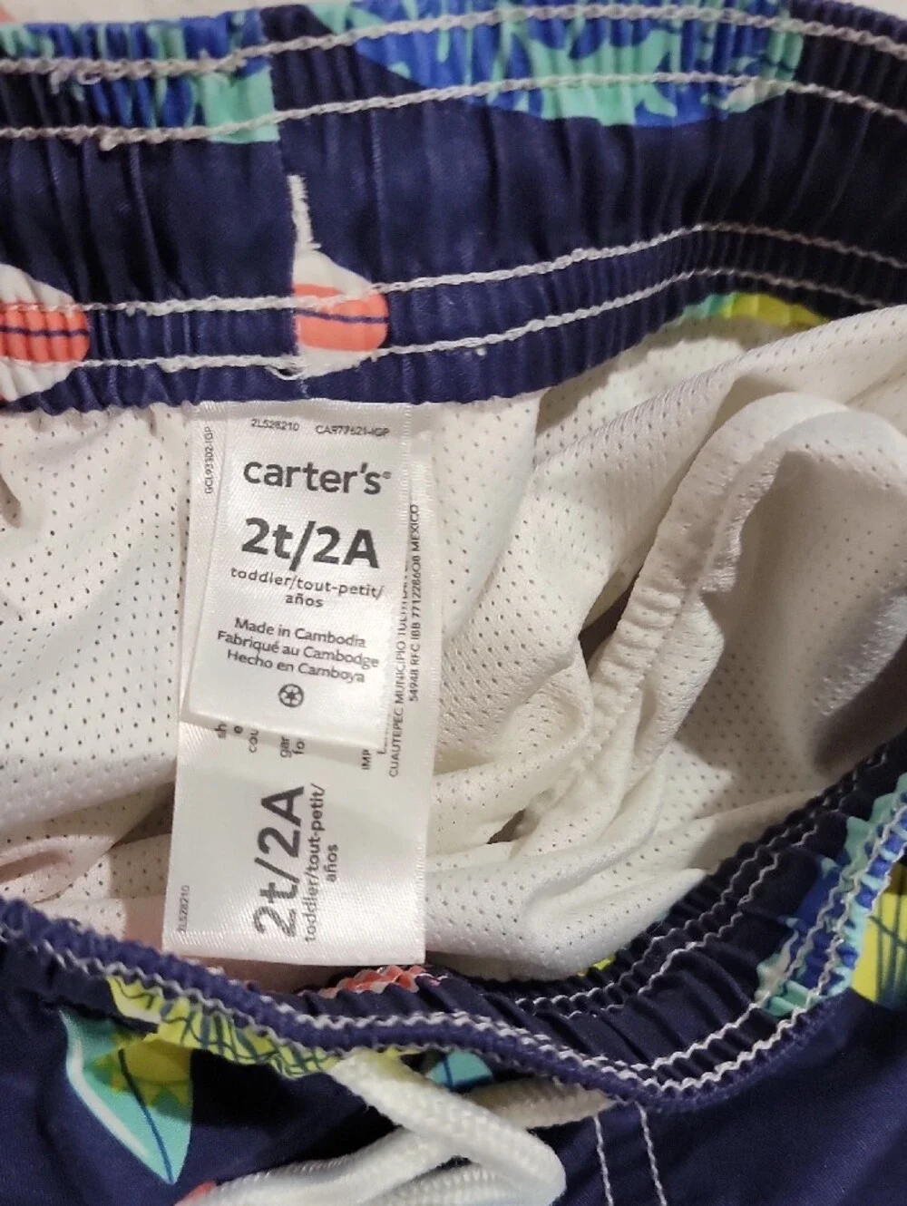 Carter's Navy Swim Trunks with Colorful Surfboard Print